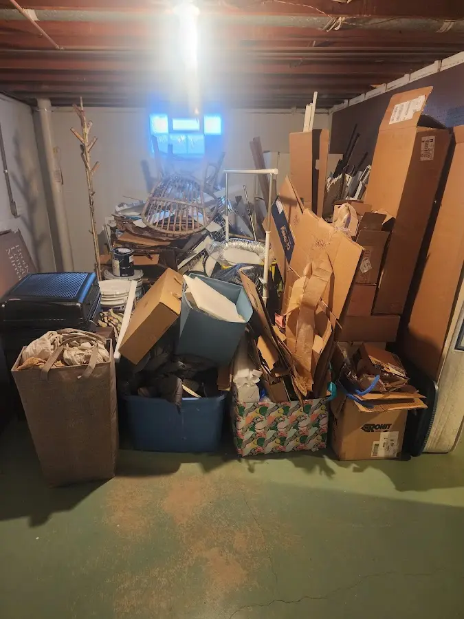 Roll-off dumpster container at job site for Roll Off Dumpster Rental in Kenner